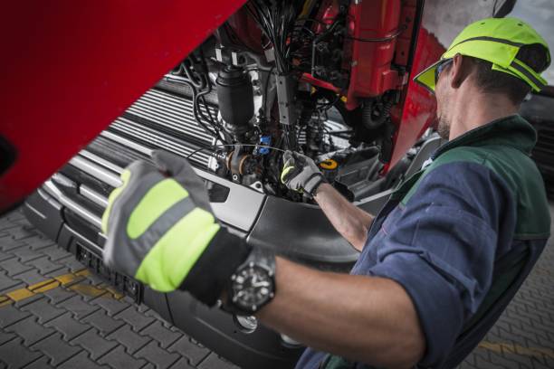 Close-Up Of Man Working In Garage
