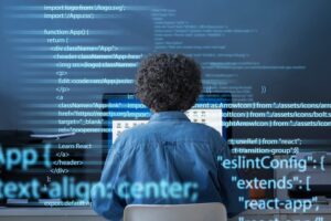 programming-background-with-person-working-with-codes-computer_23-2150010127