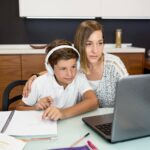mother-helping-son-with-homework (1)