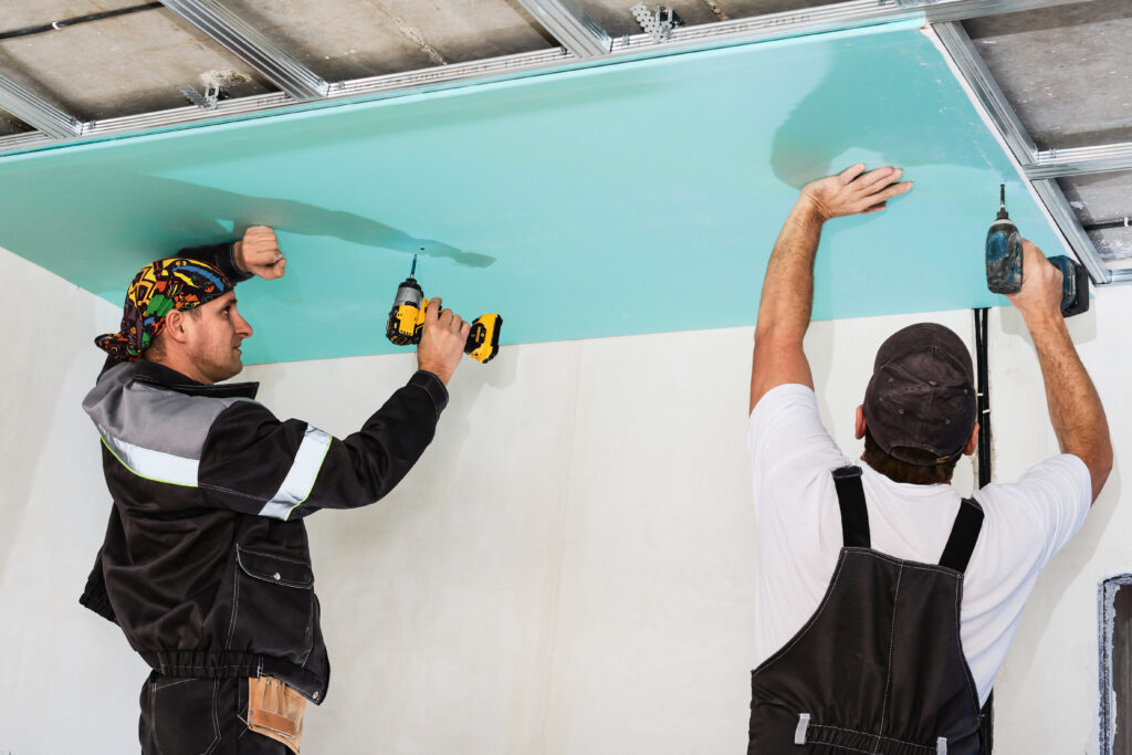 plasterboard-installers-men-assembling-drywall-false-ceiling-simple-affordable-renovation-premises-1024x683.jpg