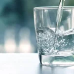 Water-being-poured-into-a-glass-up-close.-1