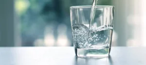 Water-being-poured-into-a-glass-up-close.-1