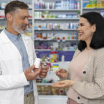 medium-shot-pharmacist-helping-patient