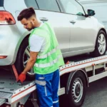 man_working_in_towing_service_on_the_road