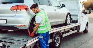 man_working_in_towing_service_on_the_road