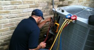 Professional air conditioning installation in Mississauga Ontario, Canada by an HVAC technician installing a high-efficiency central AC system