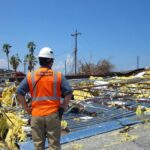 Structural engineers conducting rapid damage assessment in engineering for catastrophe response after a major hurricane, showcasing drone survey, shoring supports, and resilient rebuilding concepts