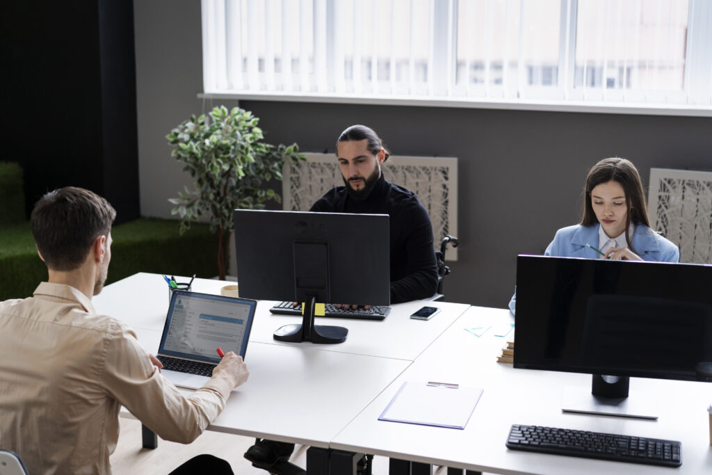 medium-shot-people-working-with-computers