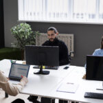 medium-shot-people-working-with-computers