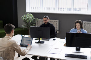 medium-shot-people-working-with-computers