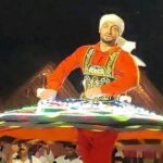 Tourists enjoying the best desert safari Dubai with dune bashing, camel riding, luxury desert camp, BBQ dinner, and stunning sunset views in the Arabian Desert.