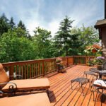 Sunny back deck with outdoor furniture.