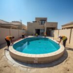 lucid-origin_A_professional_construction_crew_building_a_custom_swimming_pool_in_a_modern_Abu-0