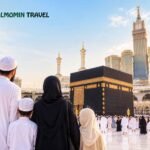 Muslim family standing together in front of the Kaaba in Makkah with Al Momin Travel logo.