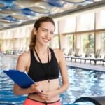 bigstock-beautiful-young-coach-holding-197868028-700x467